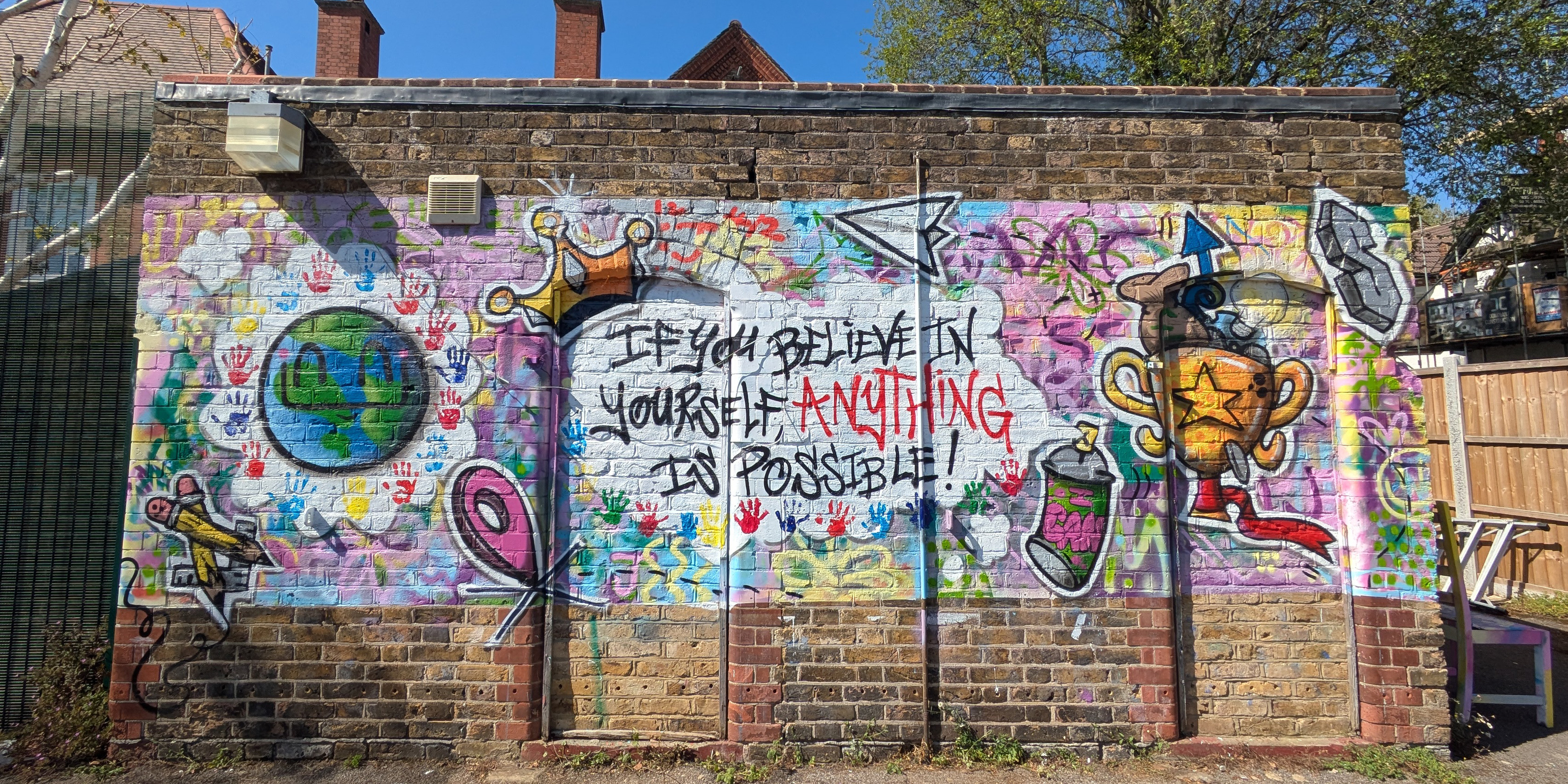 Student-led wall murals celebrating identity and inclusion